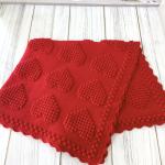 Hand-knitted baby blanket with heart pattern, red and embossed 💕