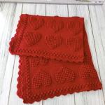 Hand-knitted baby blanket with heart pattern, red and embossed 💕